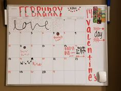 a calendar with writing on it and magnets attached to the wall next to it