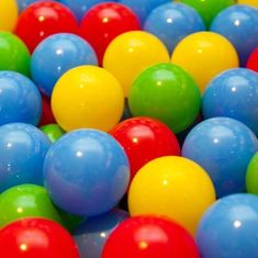 many different colored balls are scattered together