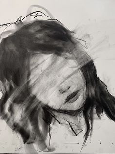 a black and white drawing of a woman's head with her hair blowing in the wind