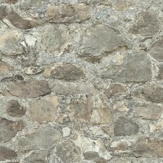 a stone wall with grey and white colors