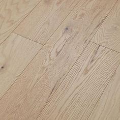 an image of wood flooring that looks like it has been cleaned and is white