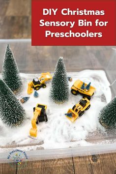 diy christmas sensory bin for preschoolers with snow and construction vehicles in the background