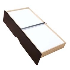 a wooden desk with a white board attached to it