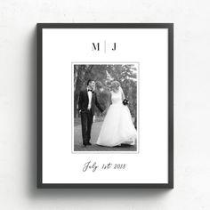 a black and white photo of a bride and groom