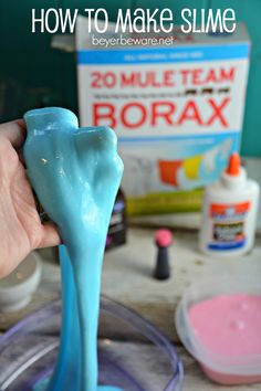 someone is pouring blue slime into a bowl to make them look like toothpaste