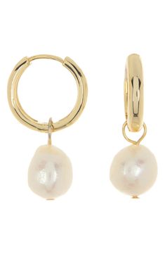 An ethereal freshwater pearl dangles from a classic huggie hoop earring on this elegant modern earring. 15mm huggie hoop, 9.5-10mm pearls Clip post back 14K gold plated base metal, freshwater pearl Imported Gold Earrings Pearl, Evry Jewels Earrings, Accessories Aesthetic Earrings, Bridesmaid Earring, 2024 Jewelry, Pearl Earring Set, Preppy Jewelry, Small Gold Hoops, Jeweled Earrings