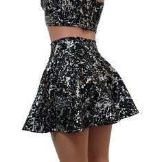 Stretch holographic black and silver splatter print spandex high-waisted skater skirt. The shimmery reflective fabric shows a rainbow of colors in the light and swings and twirls with movement. The skirt length is 15.5" from top to bottom - but if you'd like it shorter, please specify in the personalization box. Black Fitted Mini Skirt For Cheerleading, Fitted Black Mini Skirt For Cheerleading, High Waist Stretch Tennis Skirt For Party, Stretch Flared Tennis Skirt For Party, Fitted Metallic Disco Skirt, Metallic Fitted Disco Skirt, Holographic Black, Matching Top And Skirt, Reflective Fabric