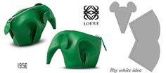 an elephant shaped purse is shown in green