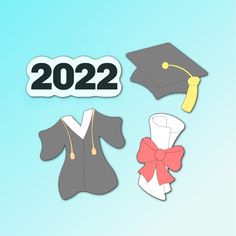 graduation hats and gowns with the year 2021 cut out