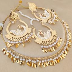 This is Handmade  Punjabi Handmade Pearl Gold Choker Set With Earings And Mangtikka For Women And Girls/ Jadau Jewelery / Jadau Earings / Punjabi Wedding Set / Indian Wedding Set / Jaggo Set / Traditional Morni Earings / Sangeet Jewelery / Thank You :) Punjabi Wedding Jewelry, Gold Punjabi Jewellery, Punjabi Gold Jewellery Set, Punjabi Bride Jewelry, Punjabi Culture Jewellery, Punjabi Wedding, Gold Choker, Indian Wedding, Jewelry Sets