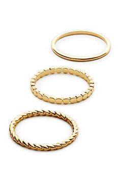 What's better than one gold ring? Three gold rings. This gold ring set is the perfect match between elevated basics and strong layering pieces, with a touch of sparkle. Wear them on the same finger, or mix and match them, they'll look perfect either way. Dipped in 14K gold Features three unique rings Depth: 1.85mm - 0.07” Weight:3.06g Crafted In China Pointer Finger Rings, Everday Rings, Dainty Rings Gold, Women’s Rings, Cute Simple Rings, Index Finger Rings For Women, Trendy Gold Rings, Push Present Ring, Daily Wear Rings