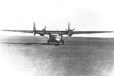 an old airplane is sitting on the runway