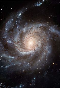 an image of a spiral galaxy in the night sky