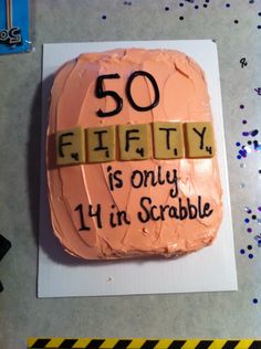 a birthday cake that says fifty is only 11 in scrabble