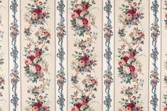 an old wallpaper with roses and blue stripes royalty photo