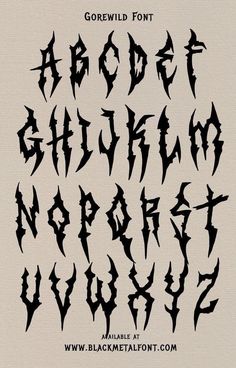 some type of gothic font that is black and white with the letters written in it