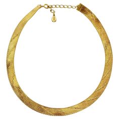 Beautiful gold plated textured mesh necklace, with a contrasting shiny line design. Measuring length approximately 40 cm / 15.7 inches plus an extension chain of 4.5 cm / 1.7 inches, by width 1 cm / .4 inch. The necklace and clasp has some wear to the gold plating. This is a stylish Egyptian Revival collar necklace, circa 1980s. Measuring Length, Mesh Necklace, Egyptian Revival, Collar Necklace, Line Design, Yves Saint Laurent, Choker Necklace, Gold Plate, Jewelry Necklaces