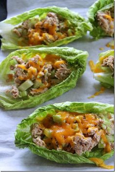 four lettuce cups filled with meat and cheese