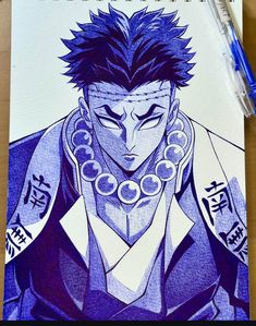 a drawing of an anime character with blue hair and piercings on his head, in front of a notebook