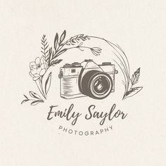 a camera and some flowers on top of a white paper with the words, family photographer