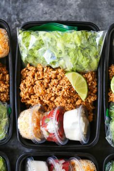 three plastic containers filled with different types of food