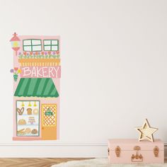 there is a wall decal with a bakery on it