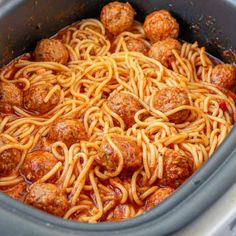 spaghetti and meatballs are being cooked in the slow cooker