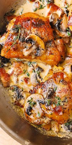 chicken with mushrooms and cheese in a pan