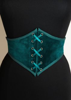 Do you like corsets but also like feeling comfortable in your clothes? This belt is made for you! This is an elastic waist cincher, made of quality duck blue velvet. Steel bones on the front of the belt provide support and give the illusion that it is a real corset. The sturdy elastic that makes up the back of this accessory provides greater sheathing than a classic belt and will adapt perfectly to your size. Possibility of choosing this model with braid (on request) or only with a cotton border Teal Corset, Cincher Belt, Duck Blue, Classic Belt, Corset Belt, Waist Cincher, Suspender Belt, Fantasy Fashion, Green Velvet