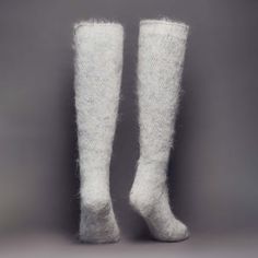 Properties: Wear them as: ✨ Ultra Warm ✨ Boot socks ✨ Odor Resistant ✨ Camping socks ✨ Wick Moisture ✨ Sleeping socks ✨ Thermoregulating ✨ Lounge wear About this Pattern: Sometimes all you need is peace and tranquility with a touch of romance thrown in. Our Misty Romance knee-high socks are for those who enjoy the small pleasures of life...Morning fog swirling through a meadow, a quiet autumn lake reflecting the fluffy clouds from above, or the sound of gently falling rain... These magical and r Soft Knee-high Socks For Stocking Stuffers, Soft White Knee-high Socks, Winter White Knee-high Stockings, White Knee-high Winter Stockings, Thick Knitted White Socks, Winter White Stretch Hosiery, White Stretch Hosiery For Winter, White Knee-high Stockings For Fall, White Thigh High Socks For Fall