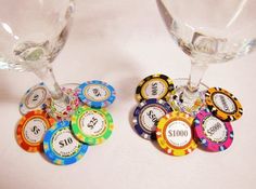 two wine glasses filled with different colored poker chips