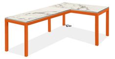 an orange and white marble top desk with wheels on the bottom, in front of a white background