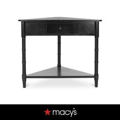 a small black table with drawers on the bottom and one drawer at the top that says macy's