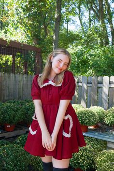 Our Red Velvet Gumdrop Dress is iced with a cream lace collar and heart shaped pockets. This dress has back shirring for maximum stretch and comfort. Also has two organza layers for extra poof! Model wearing size M. Red Peppermint Dress, Strawberry Dress Hot Topic, Mary Jane Selkie Dress, Pizza Patterned Dress, Layering Dresses For Winter Short, Matching Strawberry Dresses, Babydoll Winter Dress, Audrey Horne Dress, Cheap Long Sleeve Patchwork Mini Dress