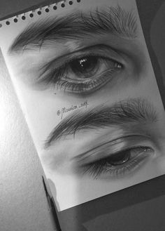 a pencil drawing of an eye with long lashes and eyelashes on it's side