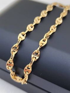 18k real gold Anchor/Mariner chain bracelet with Lobster Claw closure. 4.5 thickness. Best birthday/anniversary gift. Handmade in our shop. *7.80 inches, 4.5mm, 2.94gr* *750 Certified, stamped* Highest quality of gold ONLY REAL GOLD Priced to sell! Compare our prices to other similar sellers! Arrives in a GIFT BOX and includes FREE SHIPPING within the USA and Canada and all over the world. LIFETIME IN THE JEWELRY BUSINESS. Second-generation family member making gold and jewelry. Please feel free to ask us any questions - Always happy to help! Fast Replies to messages! Superior Quality and Best Prices! Gold And Jewelry, 18k Gold Bracelet, Gold Models, Gold Price, Jewelry Business, Gift Handmade, Chain Link Bracelet, Real Gold, Birthday Anniversary