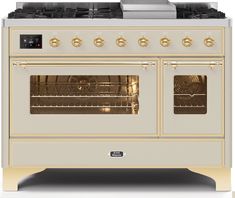 a silver and gold stove with two ovens on it's sides, in front of a white background