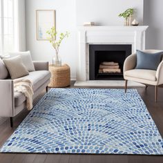 a living room filled with furniture and a blue rug on top of a hard wood floor