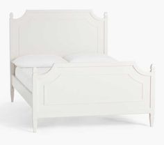 a white bed with no headboard and pillows on top of it, against a white background