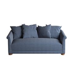 a blue and white checkered couch with pillows