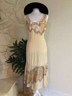 "Sister Max Silk dress Made in India 100% Silk Hand beaded, dry clean only Drop waist, beige with deco beaded design at skirt and neckline  Bust 18\" across  Waist 15\" across  Hips 18\" across  Length 42\"  Excellent condition, dry cleaning recommended before wearing" The Great Gatsby Dresses, Gatsby Dresses, Great Gatsby Dresses, Long Gowns, Gatsby Dress, Sisters Dress, Grunge Dress, Green Velvet Dress, Gatsby Style