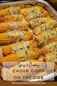 a casserole dish with corn on the cob