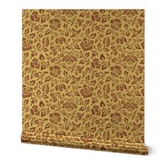 a yellow and red wallpaper with an ornate design on it's side,