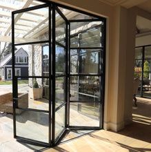 the inside of a house with glass doors