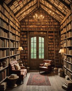 a room filled with lots of books and furniture