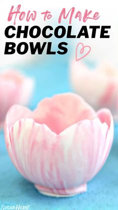 how to make chocolate bowls with pink and white swirls in the middle, on a blue surface