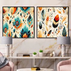 two paintings on the wall in a living room