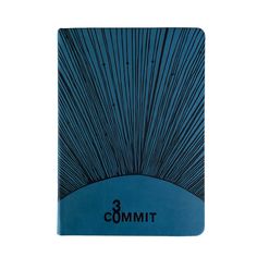 a blue notebook with the word commit written on it's front and back cover