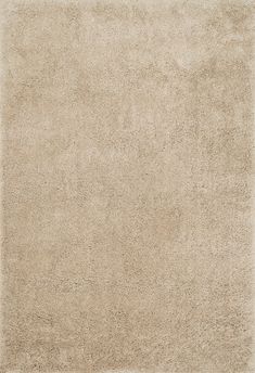 a beige area rug with no pattern on it