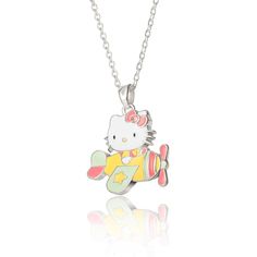 a hello kitty necklace with an airplane on it